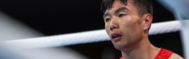 视网膜两次脱落 胡建关靠毅力站在东奥拳击赛场