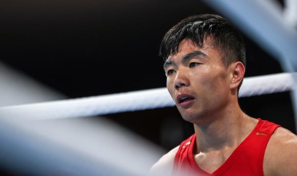 视网膜两次脱落 胡建关靠毅力站在东奥拳击赛场